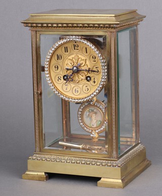 Japy Freres, a 19th Century French striking 4 glass clock, with 8 cm dial marked Edward Johnson Ltd. Paris surrounded by gilt brilliants, the back plate marked Japy Freres 12612 4.4, complete with pendulum, the bob decorated a portrait of a lady surrounded by brilliants and key, contained in a gilt metal case 24cm h x 16cm w x 13cm 