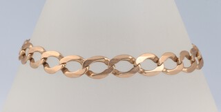 A 9ct yellow gold flat link bracelet 20cm, together with 3 loose links, 13.5 grams