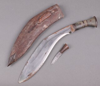 A Kukri with 32cm blade and horn grip, complete with leather scabbard and skinning knife 