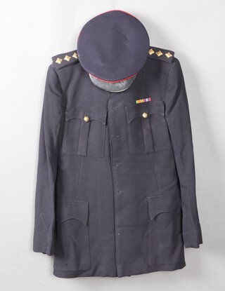 A Royal Engineers No.1 dress Captain's tunic with ribbons, a pair of oval trousers, No.1 dress cap with badge, service dress cap no badge, a pair of gaiters, 2 webbing belts and a great coat by Ernest Randall Ltd., 