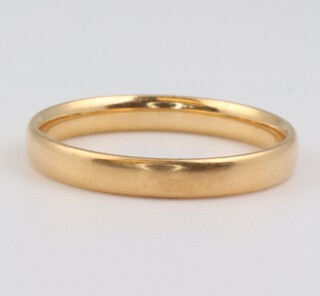 A yellow gold, testing as 18ct plain wedding band, size M, 2.2 grams 
