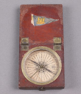 A 19th Century compass with 6cm paper dial contained in a mahogany case 288 