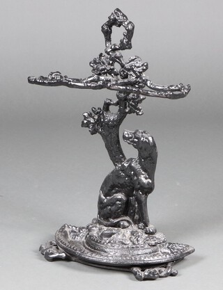 A Victorian cast iron umbrella stand decorated a standing dog 68cm h x 43cm w x 22cm d 