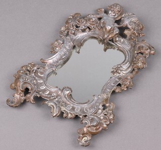 A Continental cast metal mirror frame surmounted by a cherub set a later plate mirror (formerly an easel mirror) 26cm x 17cm 