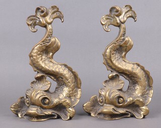 A pair of cast brass door stops in the form of dolphins 35cm x 21cm x 7cm 