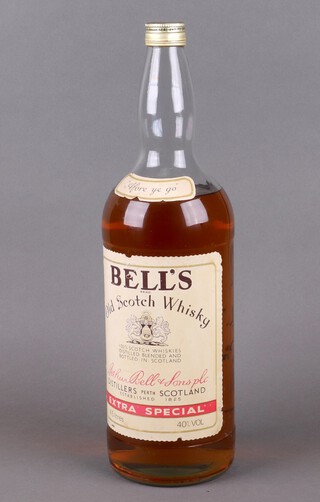 A 4.5 litre bottle of Bells Old Scotch Whisky, (seal broken, so for decorative purposes only) 