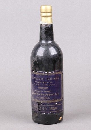 A bottle of Verdelho Solera 1880 Madeira, produced and shipped by Blandy's Madeiras, bottled by Edward D Young 