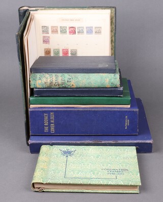 An album of Elizabeth II Machin definitive stamps 1967 to 1971, an album of first day covers, an album of Coronation stamps 1935-1953, green album of used world stamps - Rhodesia, Transvaal, Orange Free state, a Lincoln stamp album of world stamps, a C-B Collector's binder of world stamps and 3 stock books of world stamps 