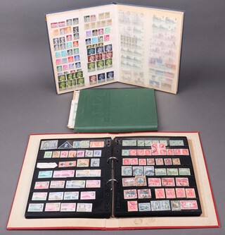 A ring bound album of mint and used GB stamps Victoria to Elizabeth II, a stock book of GB stamps mint and used including a penny black, tuppenny blues and penny reds and later stamps, together with a small collection of George VI stamp sheets 