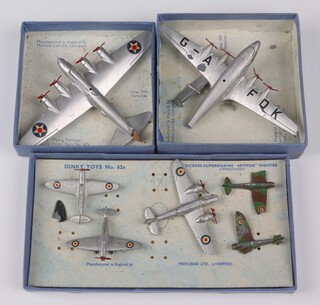 A Dinky No.62G model Boeing Flying Fortress boxed (damage to box), a Dinky 62W Imperial Airways Frobisher Class Airliner boxed (tail is broken and in 2, loss to paint fork), a Dinky Blenheim Bomber Hawker Hurricane  (x2) and 2 Spitfires (a/f) boxed 
