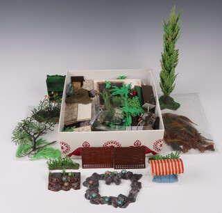 A quantity of Britain's plastic floral garden items  