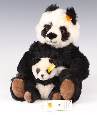 A Steiff Panda 660818 together with Baby Panda 660881 