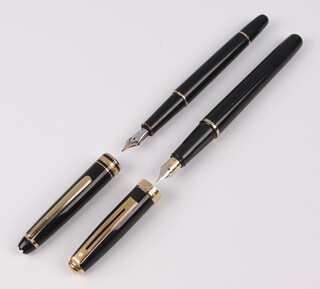 A Mont Blanc fountain pen, the lid marked 4810 together with a Sheaffer fountain pen 