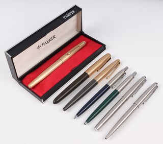 Two Parker fountain pens with gold plated tops in grey cases, a gold plated cased Parker fountain pen, 3 Parker ballpoint pens (1 a/f) and 1 other 