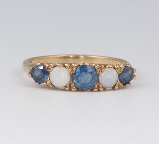 A 9ct yellow gold dress ring set 2 opals and 3 sapphires, size K, 1.68g gross