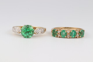 Two 9ct yellow gold dress rings set green stones, sizes J and J 1/2, 4.8 grams gross 