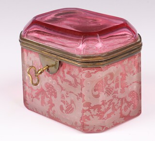 A 19th Century Bohemian red overlay glass trinket box with hinged lid 7cm h x 9cm w x 7cm d, complete with key (the key is bent) 