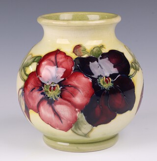 A William Moorcroft Clematis pattern yellow glazed vase (1938-1945), impressed Moorcroft with signature mark 15cm 