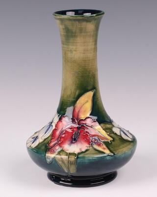 A William Moorcroft blue and green glazed orchid pattern vase, the base impressed Sir William Moorcroft Potter to HM The Queen and signature mark 15cm 