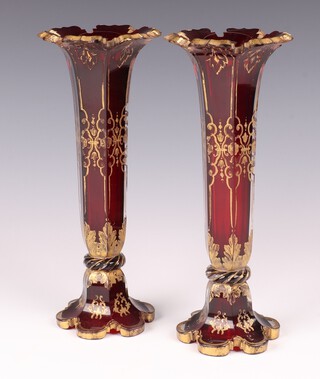 A pair of Victorian Bohemian hexagonal red overlay glass vases with gilt decoration 23cm 