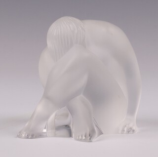 A Lalique 1993 clear glass figure of a seated nude female 6cm, boxed 