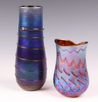 A Siddy Langley purple etched glass vase with spiral ribbed decoration, signed to the base 21cm together with a ditto purple glass vase with wave decoration 12cm 