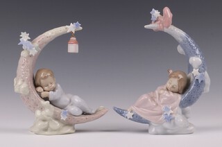 A pair of Lladro figures Heavenly Slumber no. 6479 17.5cm and Heaven's Lullaby no. 6583 21cm 