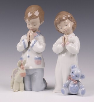 A pair of Lladro figures - Night Time Blessings  and Bless Us All 17cm 
