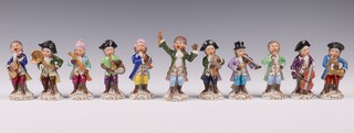 A Sitzendorf 19th Century 11 piece monkey band including conductor 12cm, cellist, violinist 10cm etc.