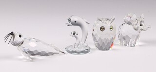 Five Swarovski Crystal figures - elephant 5cm, 2 dolphins, an owl and a seal, all boxed