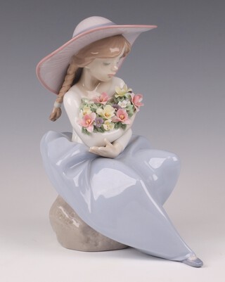 A Lladro figure - Fragrant Bouquet 5862, 18cm boxed 