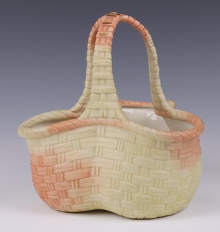 A Lock & Co Worcester blush ivory porcelain vase in the form of a basket 21cm, base with green Lock and Co mark and Y64 A
