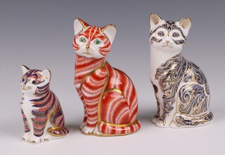 Three Royal Crown Derby Imari pattern paperweight - Kitten LIII 8cm with silver stopper, Cat LIII gold stopper 14cm and Majestic Cat limited edition no. 3325/3500 with silver stopper, all boxed 