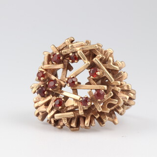 A 9ct yellow gold garnet set dress ring, size L, 7.6 grams  