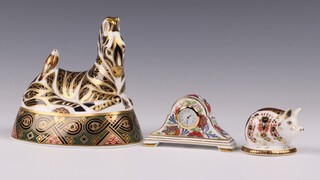 Three Royal Crown Derby Imari pattern 1995 paperweights - Zebra LXII with silver stopper 14cm, Pig LXI with gold stopper 5cm and a miniature Bakewell Arita timepiece 4cm missing stopper, all boxed 