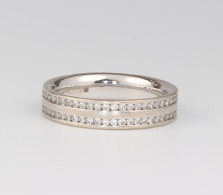 An 18ct white gold wedding band set diamonds, size G 1/2, 3.2 grams 
