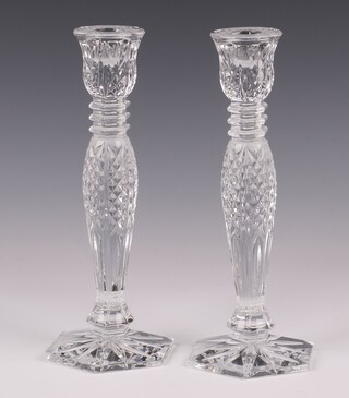 A pair of Waterford Crystal Bethany pattern candlesticks 25cm, boxed 