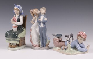 Three Lladro figures - Lets Make Up 5555 20cm, Study Buddies 5451 and a seated girl with vase of flowers 