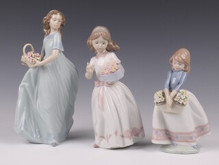 Three Lladro figures - May Flowers 16cm, Special Someone 22cm and Spring Enchantment 20cm, all boxed 