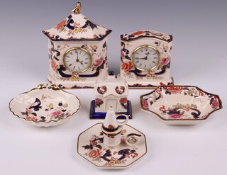 A Masons blue Mandalay pattern arch shaped timepiece 13cm, 1 other timepiece, chamber stick and snuffer 13cm, scalloped dish 14cm, a shaped dish 17cm and a model of a house 9cm  
