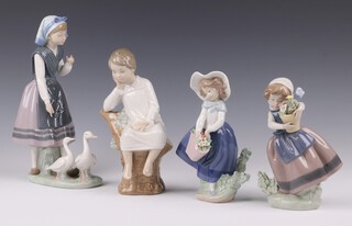 Two Lladro figures - Spring Is Here 5223, Pretty Pickings 5222 (both boxed) and 2 other Lladro figures  - girl with a goose A-24E and a seated boy in night shirt A-12JU  