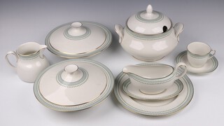 A Royal Doulton Berkshire pattern extensive dinner/tea service comprising a circular tureen and cover, 2 circular tureens, 2 graduated oval meat plates, large circular bowl (2nd), 2 oval bowls (1 a 2nd), 2 sauce boats and stands, 20 dinner plates, 20 side plates, 10 soup bowls, 23 cereal bowls (3 x 2nds), 15 pudding bowls (4 x 2nds), 24 tea plates, 3 graduated jugs (2 x 2nds), 20 tea cups, 22 saucers, large sugar bowl (2nd), small sugar bowl (2nd), 2 egg cups (1 a 2nd), circular platter, 2 twin handled plates 