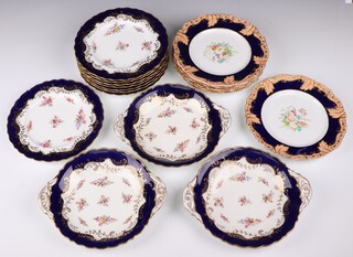 A Coalport blue and gilt banded 11 piece dessert service comprising 3 twin handled dishes (2 cracked) and 8 plates (1 chipped), the bases impressed 82K14 and 8669 together with 6 similar plates with floral decoration and gilt banding marked 692455