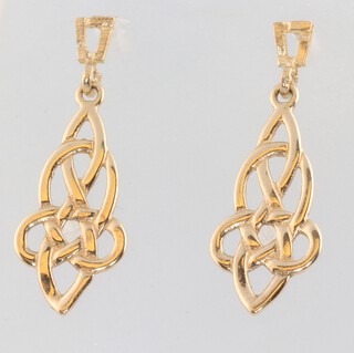 A pair of yellow gold testing as 9ct earrings, 1 grams 