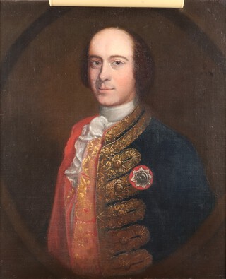 Attributed to John Lewis (act. 1736-1776), Half Length Portrait of a Gentleman wearing a Navy Blue Jacket with Gold Brocade, Red Lining, and the embroidered badge of the Sea Serjeants, within a feigned oval, traditionally identified as Sir Robert Skyrme, 18th century oil on canvas, engraved ex-libris of Sea Serjeants affixed verso, 75cm x 61cm, within a gilt composition frame. Note: The Jacobite Society of Sea Sergeants was based in West and South Wales. They convened once a year at a seaside location, often for a week at a time, and unlike some societies did have women present at meetings. Provenance: noted as being in the possession of P.C.M. Hughes-Garbett in 1930.	