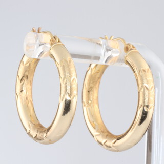 A pair of 14ct hollow hoop earrings 2.9 grams 