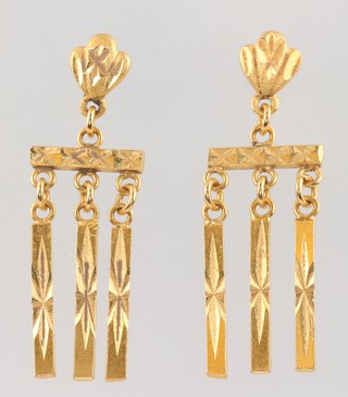 A pair of pierced yellow gold, testing as 14ct earrings, 5.7 grams 