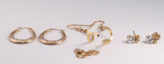 Two pairs of 9ct earrings 2 grams, a 9ct gold pair of earrings set cubic zirconia 1.7 grams and a section of 5 links of 9ct gold chain 0.7 grams