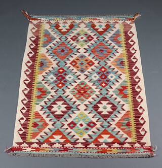 A white, turquoise and green ground Chobi Kilim rug 146cm x 106cm  