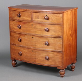 A 19th Century mahogany bow front chest of 2 short and 3 long drawers with turned handles, raised on turned supports 106cm h x 109cm w x 54cm d 